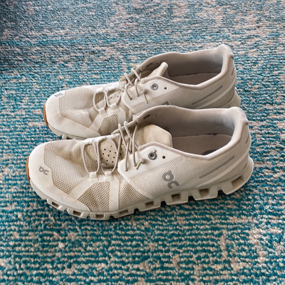 On Cloud Running Shoe in white/sand.